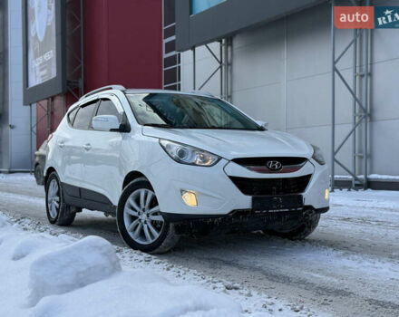 Білий Хендай іх35, об'ємом двигуна 2 л та пробігом 175 тис. км за 11999 $, фото 1 на Automoto.ua