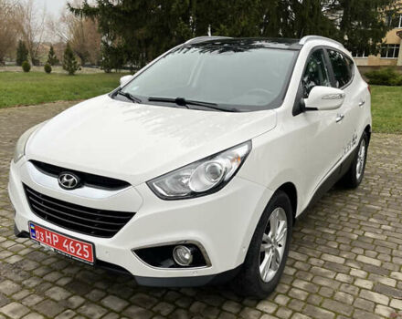 Білий Хендай іх35, об'ємом двигуна 2 л та пробігом 202 тис. км за 13500 $, фото 1 на Automoto.ua