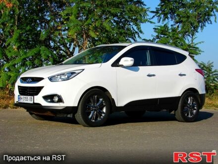 Білий Хендай іх35, об'ємом двигуна 2 л та пробігом 128 тис. км за 16000 $, фото 1 на Automoto.ua