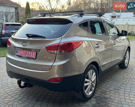 Бежевый Хендай их35, объемом двигателя 2 л и пробегом 147 тыс. км за 11800 $, фото 31 на Automoto.ua