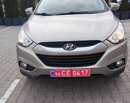 Бежевый Хендай их35, объемом двигателя 2 л и пробегом 200 тыс. км за 10990 $, фото 3 на Automoto.ua