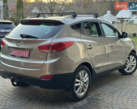 Бежевый Хендай их35, объемом двигателя 2 л и пробегом 147 тыс. км за 11800 $, фото 7 на Automoto.ua