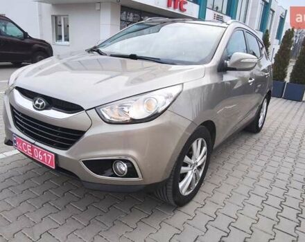 Бежевый Хендай их35, объемом двигателя 2 л и пробегом 200 тыс. км за 10990 $, фото 2 на Automoto.ua