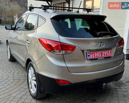 Бежевый Хендай их35, объемом двигателя 2 л и пробегом 147 тыс. км за 11800 $, фото 29 на Automoto.ua