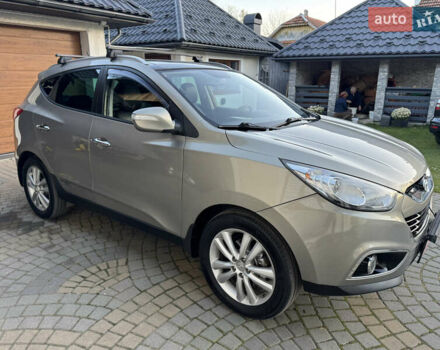 Бежевый Хендай их35, объемом двигателя 2 л и пробегом 147 тыс. км за 11800 $, фото 33 на Automoto.ua