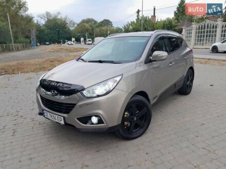 Бежевий Хендай іх35, об'ємом двигуна 2 л та пробігом 220 тис. км за 11700 $, фото 1 на Automoto.ua