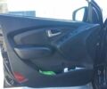 Черный Хендай их35, объемом двигателя 2 л и пробегом 240 тыс. км за 8990 $, фото 5 на Automoto.ua