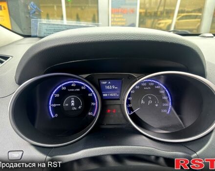 Чорний Хендай іх35, об'ємом двигуна 2 л та пробігом 116 тис. км за 10800 $, фото 6 на Automoto.ua