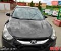Черный Хендай их35, объемом двигателя 2 л и пробегом 290 тыс. км за 10500 $, фото 3 на Automoto.ua
