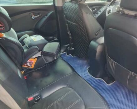 Чорний Хендай іх35, об'ємом двигуна 2 л та пробігом 119 тис. км за 12300 $, фото 28 на Automoto.ua