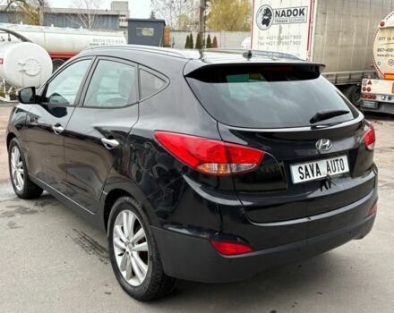 Чорний Хендай іх35, об'ємом двигуна 2 л та пробігом 141 тис. км за 4000 $, фото 6 на Automoto.ua