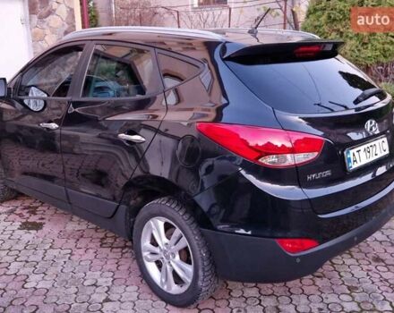 Черный Хендай их35, объемом двигателя 2 л и пробегом 264 тыс. км за 11900 $, фото 2 на Automoto.ua
