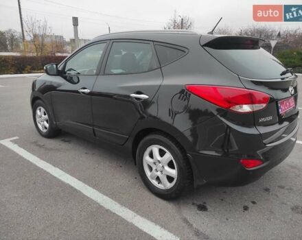 Черный Хендай их35, объемом двигателя 2 л и пробегом 249 тыс. км за 11900 $, фото 5 на Automoto.ua