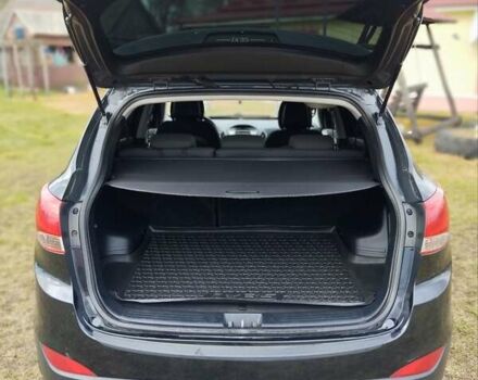 Черный Хендай их35, объемом двигателя 1.69 л и пробегом 250 тыс. км за 11888 $, фото 8 на Automoto.ua