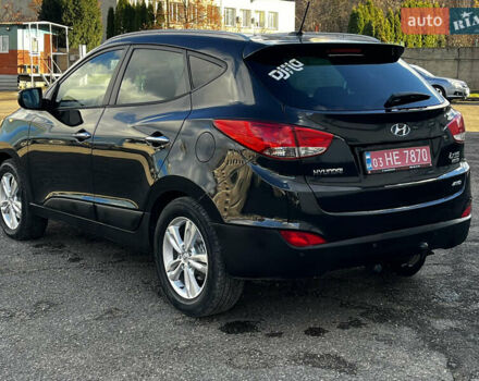 Чорний Хендай іх35, об'ємом двигуна 2 л та пробігом 225 тис. км за 12999 $, фото 6 на Automoto.ua