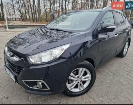 Чорний Хендай іх35, об'ємом двигуна 2 л та пробігом 119 тис. км за 12300 $, фото 5 на Automoto.ua