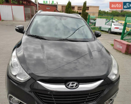 Черный Хендай их35, объемом двигателя 1.6 л и пробегом 295 тыс. км за 10500 $, фото 1 на Automoto.ua
