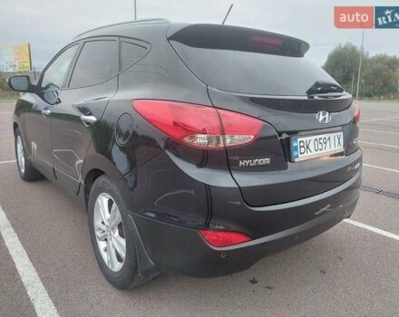 Черный Хендай их35, объемом двигателя 2 л и пробегом 173 тыс. км за 11900 $, фото 6 на Automoto.ua