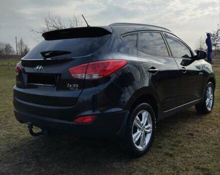 Черный Хендай их35, объемом двигателя 1.69 л и пробегом 250 тыс. км за 11888 $, фото 5 на Automoto.ua