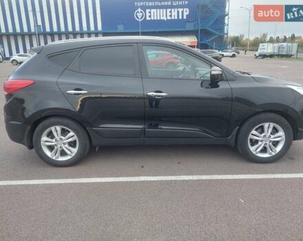 Черный Хендай их35, объемом двигателя 2 л и пробегом 173 тыс. км за 11900 $, фото 3 на Automoto.ua