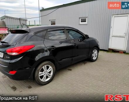 Черный Хендай их35, объемом двигателя 2 л и пробегом 290 тыс. км за 10500 $, фото 1 на Automoto.ua