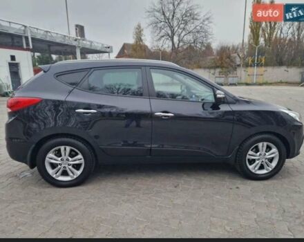 Чорний Хендай іх35, об'ємом двигуна 2 л та пробігом 119 тис. км за 12300 $, фото 12 на Automoto.ua
