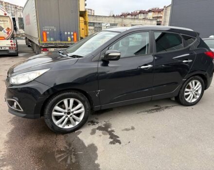 Чорний Хендай іх35, об'ємом двигуна 2 л та пробігом 141 тис. км за 4000 $, фото 4 на Automoto.ua