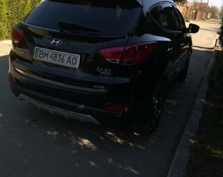 Чорний Хендай іх35, об'ємом двигуна 2.4 л та пробігом 213 тис. км за 12000 $, фото 4 на Automoto.ua