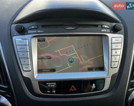 Чорний Хендай іх35, об'ємом двигуна 2 л та пробігом 226 тис. км за 12999 $, фото 29 на Automoto.ua