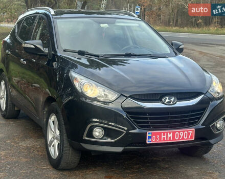 Чорний Хендай іх35, об'ємом двигуна 2 л та пробігом 240 тис. км за 12500 $, фото 2 на Automoto.ua