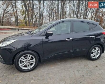 Чорний Хендай іх35, об'ємом двигуна 2 л та пробігом 119 тис. км за 12300 $, фото 1 на Automoto.ua