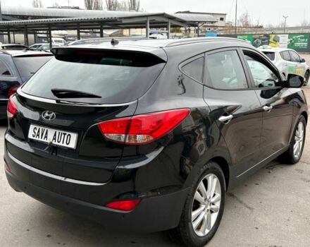 Чорний Хендай іх35, об'ємом двигуна 2 л та пробігом 141 тис. км за 4000 $, фото 7 на Automoto.ua