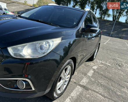 Чорний Хендай іх35, об'ємом двигуна 2 л та пробігом 196 тис. км за 12900 $, фото 7 на Automoto.ua