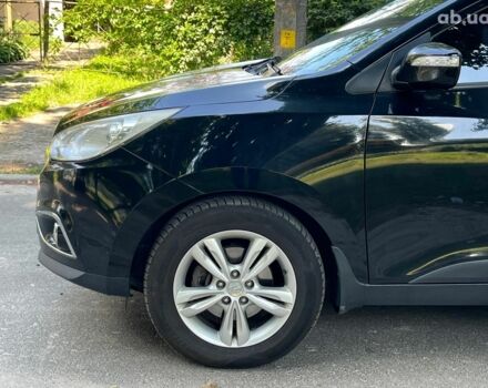 Чорний Хендай іх35, об'ємом двигуна 2 л та пробігом 195 тис. км за 13790 $, фото 3 на Automoto.ua