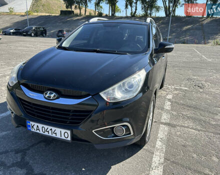 Чорний Хендай іх35, об'ємом двигуна 2 л та пробігом 196 тис. км за 12900 $, фото 4 на Automoto.ua