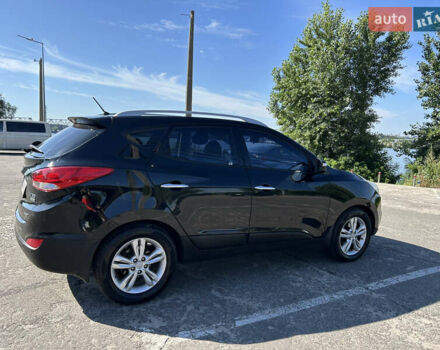 Чорний Хендай іх35, об'ємом двигуна 2 л та пробігом 196 тис. км за 12900 $, фото 2 на Automoto.ua