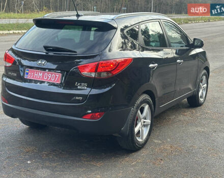 Чорний Хендай іх35, об'ємом двигуна 2 л та пробігом 240 тис. км за 12500 $, фото 8 на Automoto.ua