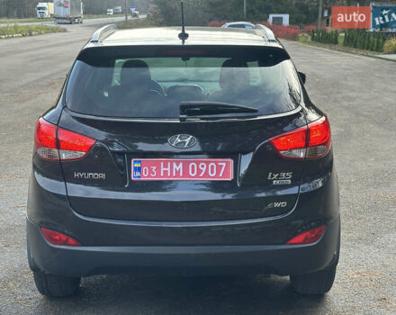 Чорний Хендай іх35, об'ємом двигуна 2 л та пробігом 240 тис. км за 12500 $, фото 7 на Automoto.ua