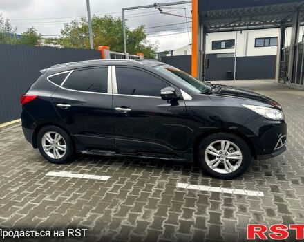 Чорний Хендай іх35, об'ємом двигуна 2 л та пробігом 116 тис. км за 10800 $, фото 3 на Automoto.ua