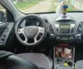 Черный Хендай их35, объемом двигателя 2 л и пробегом 190 тыс. км за 12800 $, фото 6 на Automoto.ua