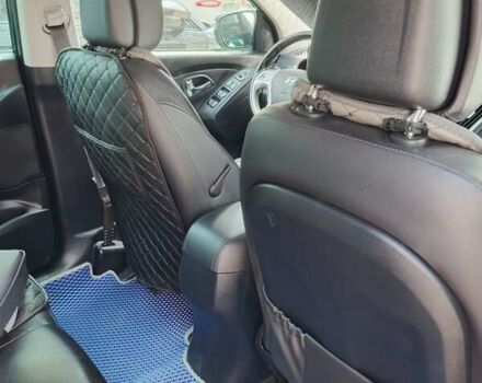 Чорний Хендай іх35, об'ємом двигуна 2 л та пробігом 119 тис. км за 12300 $, фото 24 на Automoto.ua