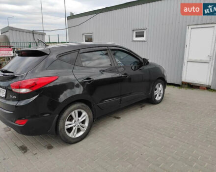 Черный Хендай их35, объемом двигателя 1.6 л и пробегом 295 тыс. км за 10500 $, фото 11 на Automoto.ua