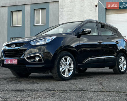 Чорний Хендай іх35, об'ємом двигуна 2 л та пробігом 226 тис. км за 12999 $, фото 9 на Automoto.ua