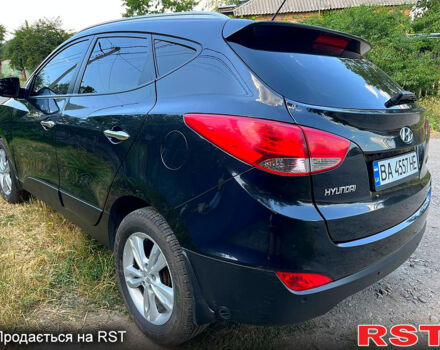 Черный Хендай их35, объемом двигателя 2 л и пробегом 120 тыс. км за 14000 $, фото 4 на Automoto.ua