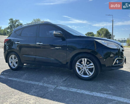 Чорний Хендай іх35, об'ємом двигуна 2 л та пробігом 196 тис. км за 12900 $, фото 3 на Automoto.ua