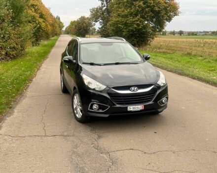 Черный Хендай их35, объемом двигателя 2 л и пробегом 233 тыс. км за 13500 $, фото 4 на Automoto.ua