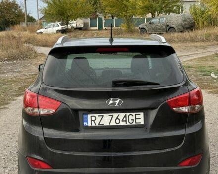 Чорний Хендай іх35, об'ємом двигуна 2 л та пробігом 237 тис. км за 7100 $, фото 4 на Automoto.ua