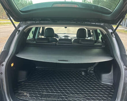 Чорний Хендай іх35, об'ємом двигуна 2 л та пробігом 240 тис. км за 12500 $, фото 14 на Automoto.ua