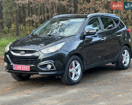 Чорний Хендай іх35, об'ємом двигуна 2 л та пробігом 240 тис. км за 12500 $, фото 4 на Automoto.ua