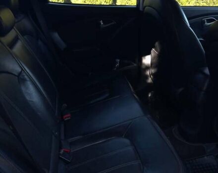 Чорний Хендай іх35, об'ємом двигуна 2.4 л та пробігом 213 тис. км за 12000 $, фото 7 на Automoto.ua